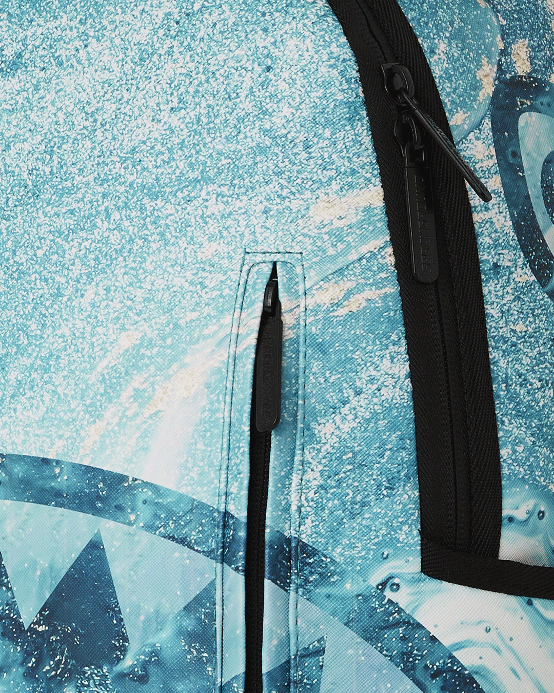 Close-up of the adjustable straps on the Tectonic Luxe Faux Leather Backpack.