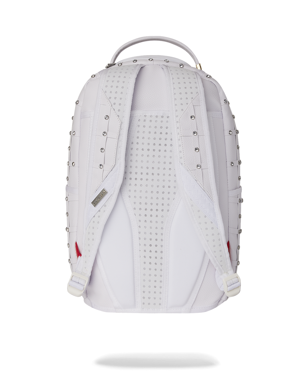 Interior of the faux leather backpack highlighting the laptop compartment.