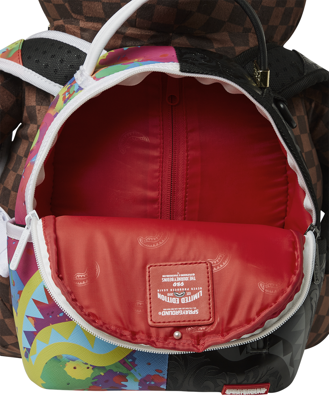 Cuddly teddy bear backpack worn by a child on a hiking trail