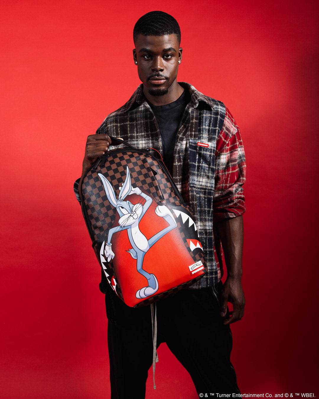 Bugs Bunny backpack with adjustable straps and side pockets.