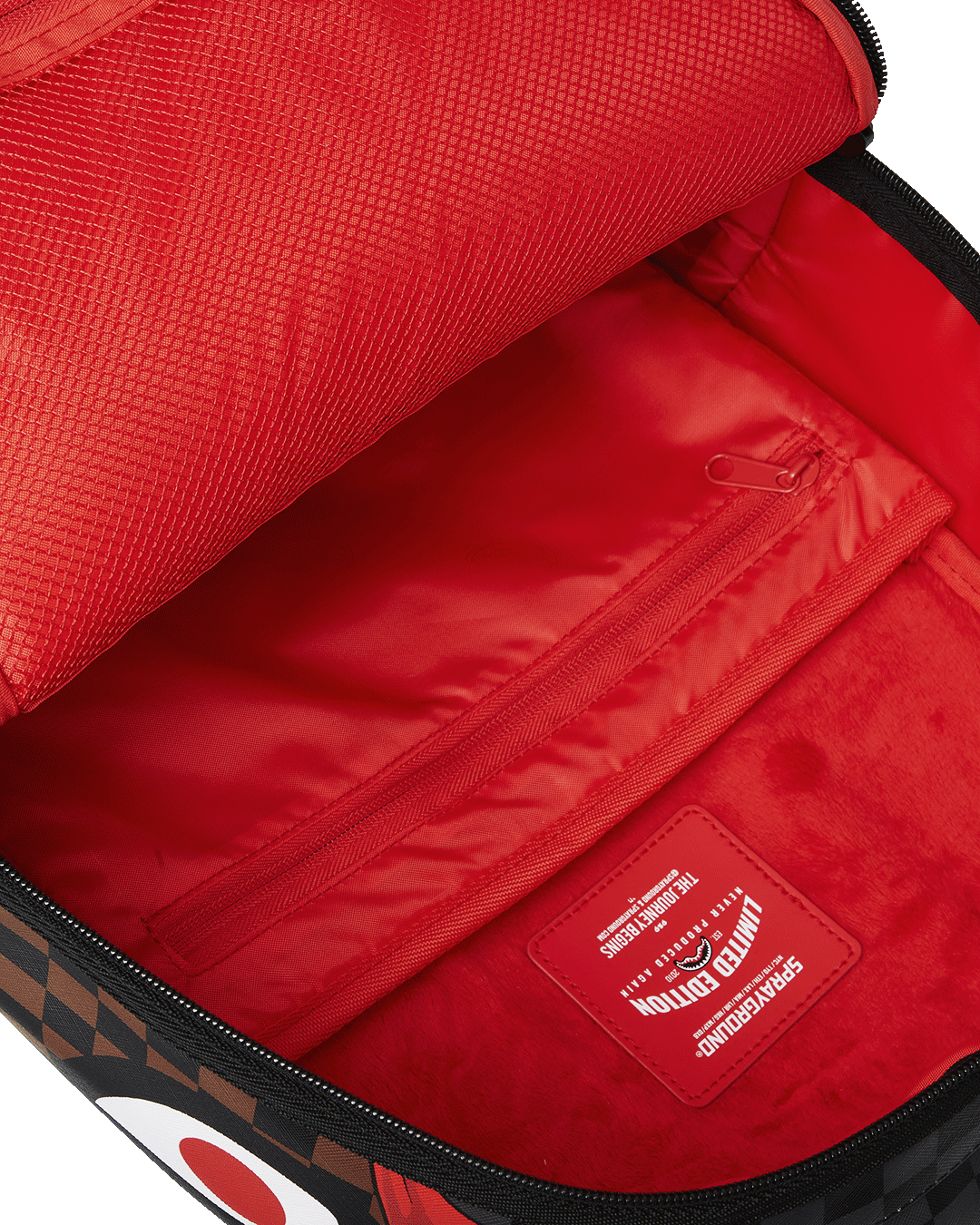 Interior view of the faux leather laptop backpack showcasing the velour compartment.