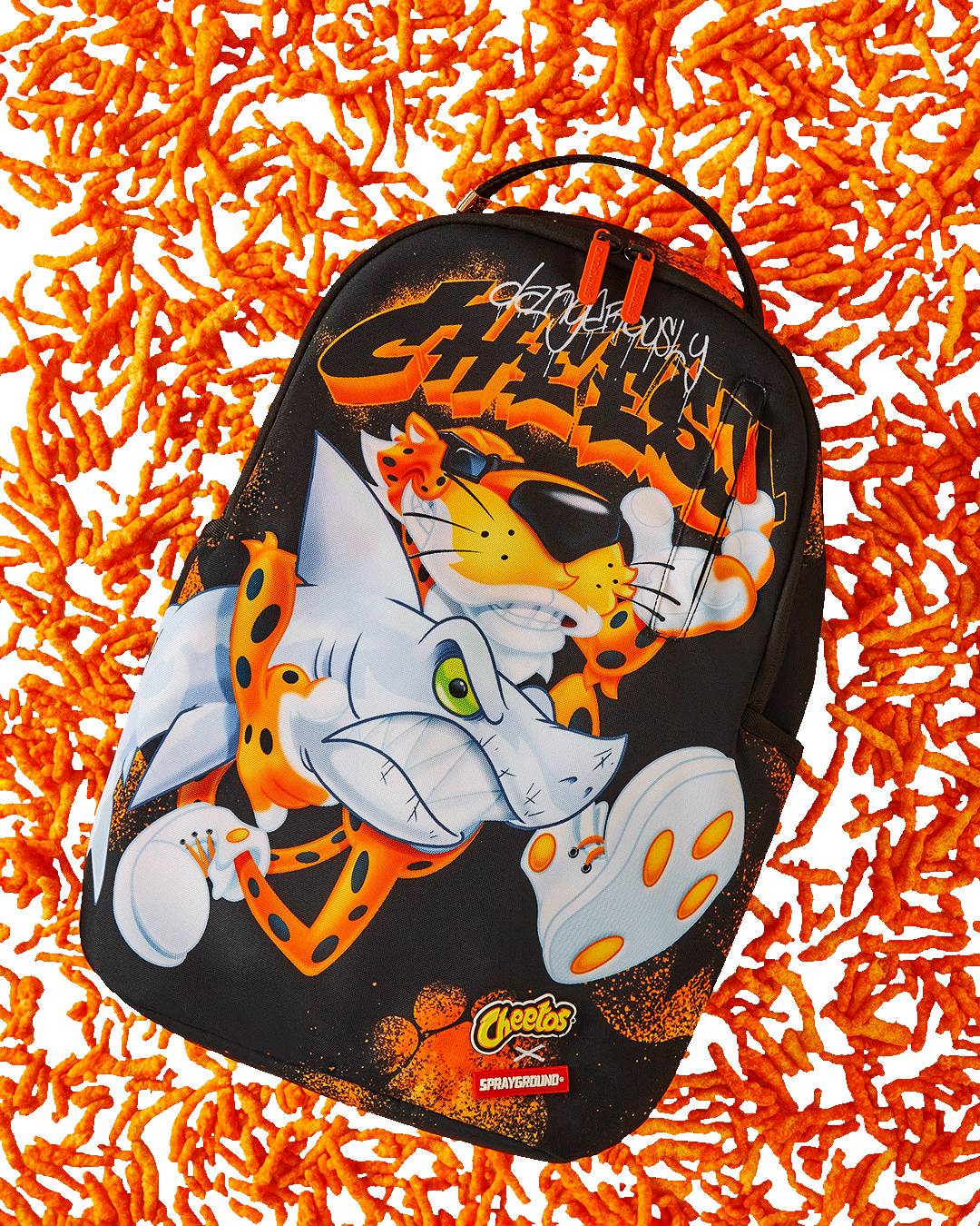 Interior view of Cheetos Shark Runner backpack showing laptop compartment and organizer pocket