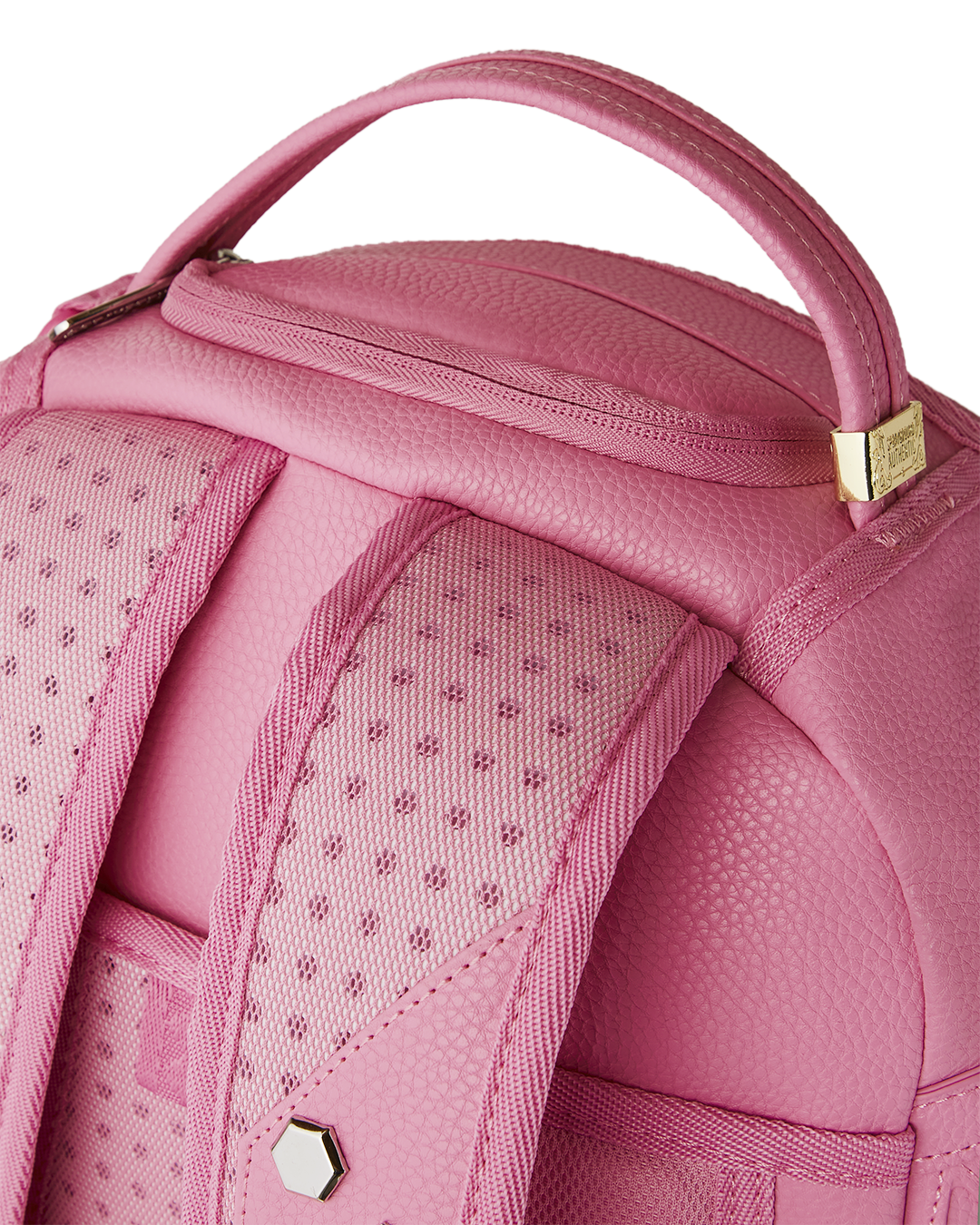 Interior view of backpack showing separate velour laptop compartment and mesh organizer pocket