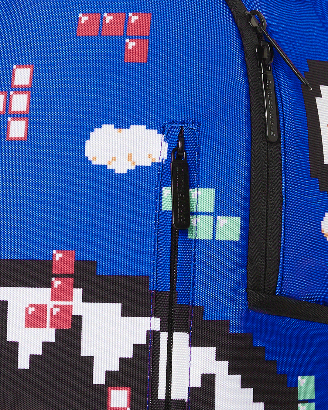 Close-up of the backpacks laptop compartment and gold zippers