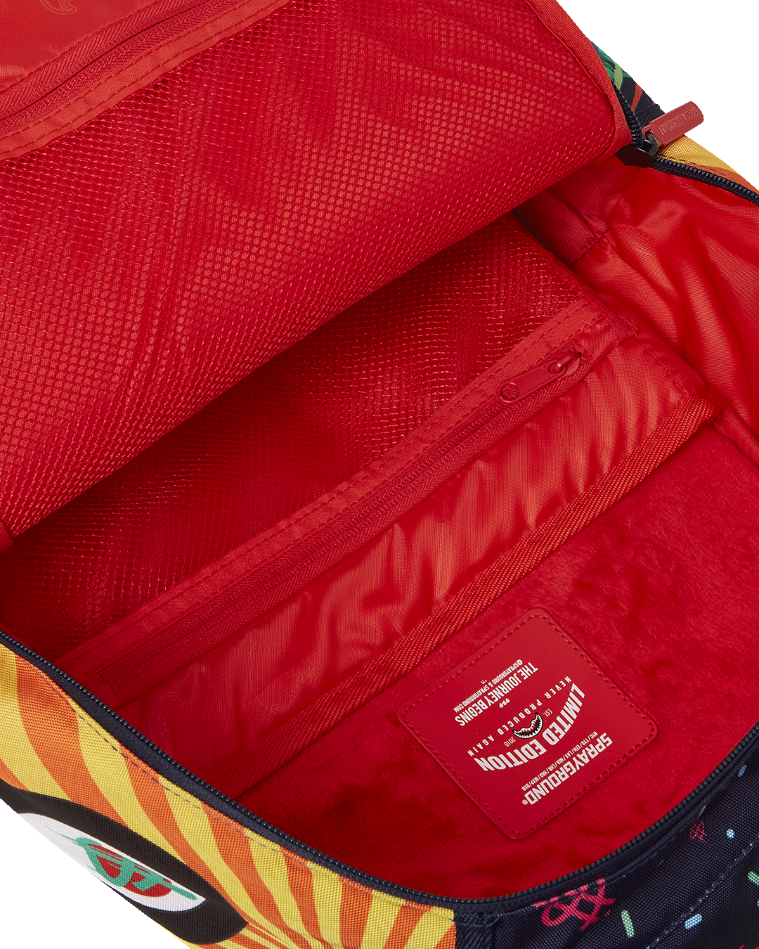 Front view of the stylish designer backpack with gold hardware and multiple compartments