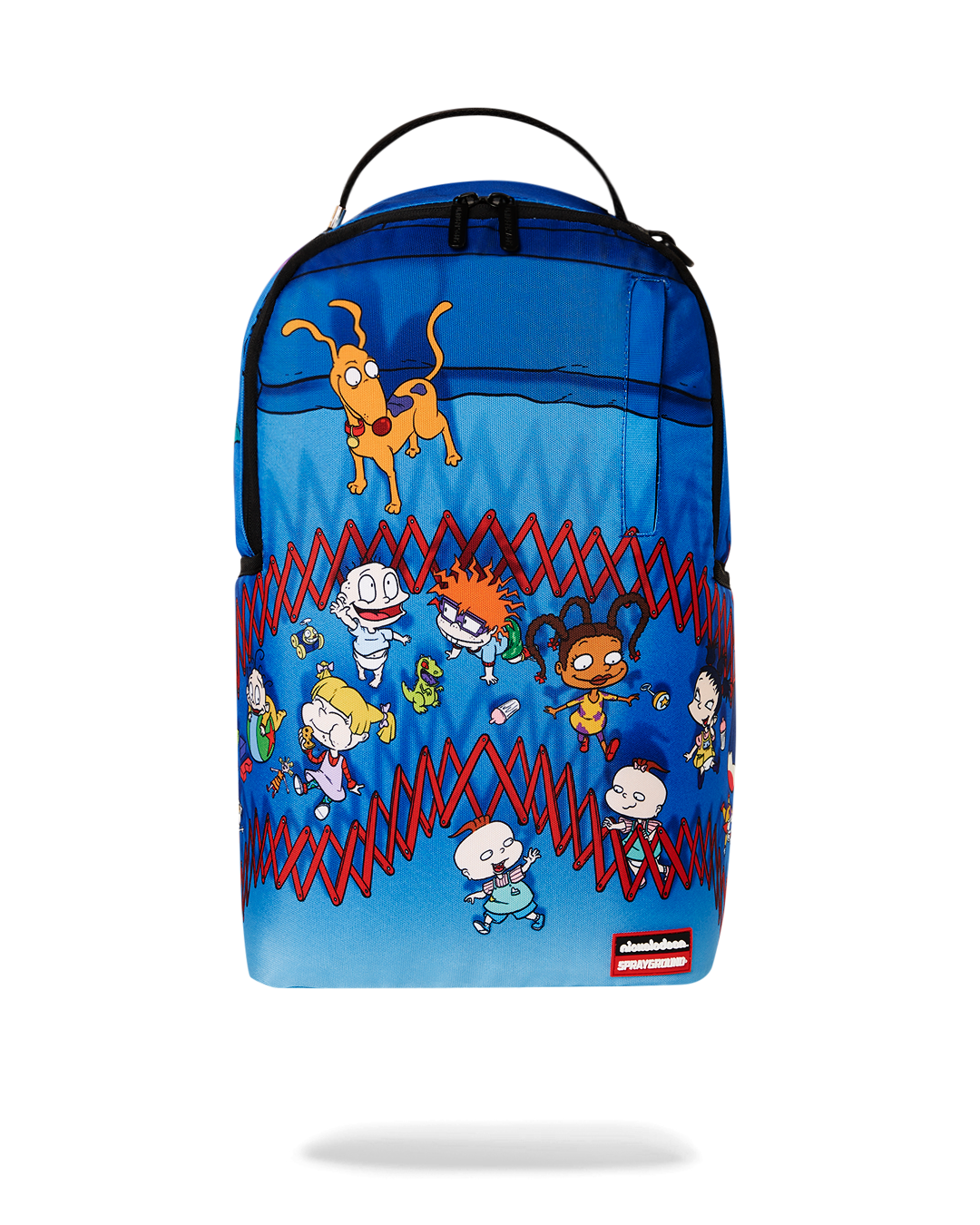 Close-up of Rugrats sprayground backpack with sharkmouth design and gold zippers
