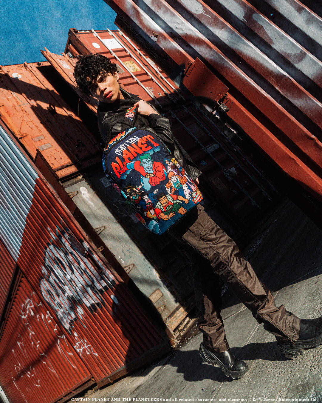 Side view of the Captain Planet DLXSR Backpack with pockets and features visible.