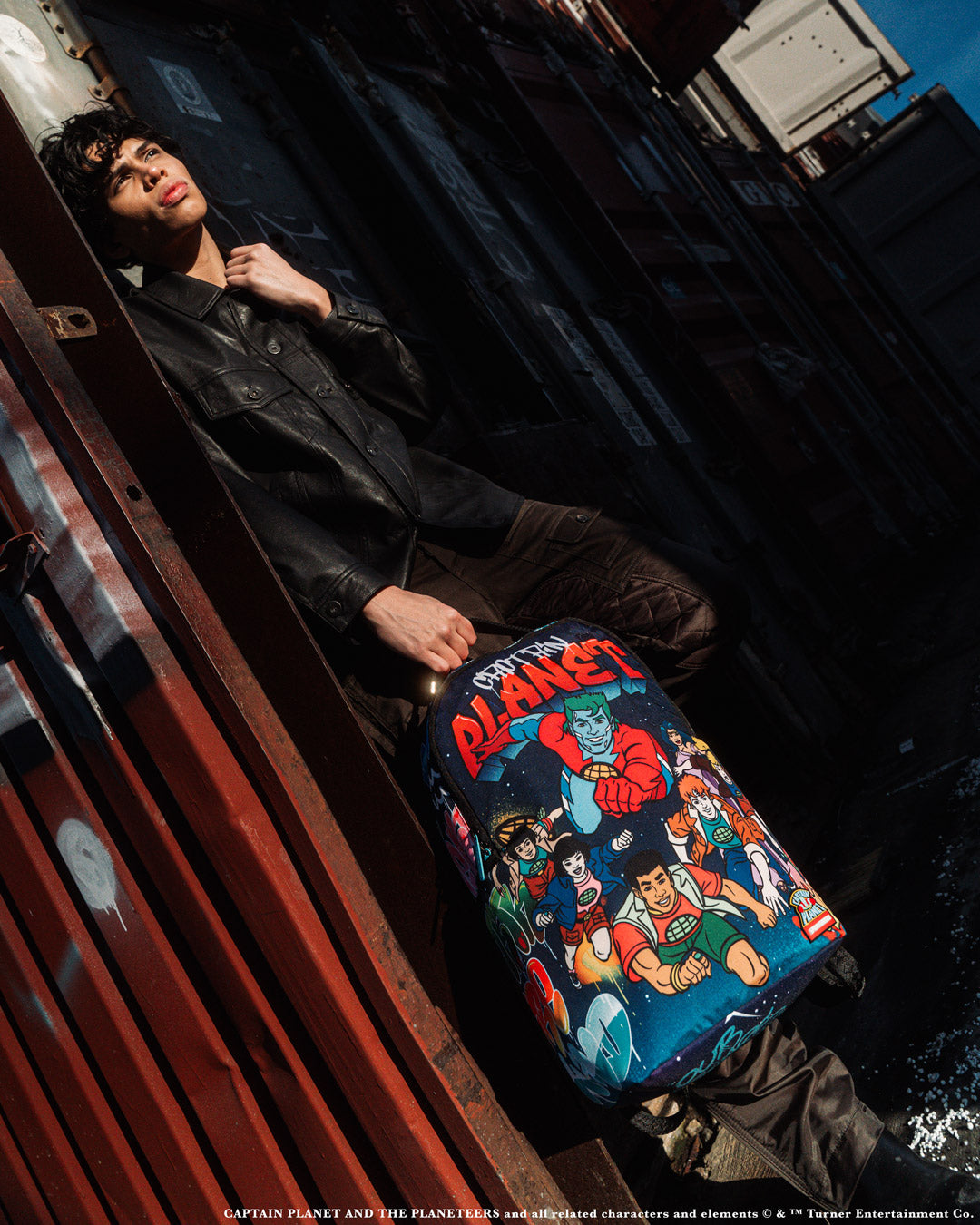 Side view of the Captain Planet DLXSR Backpack with pockets and features visible.