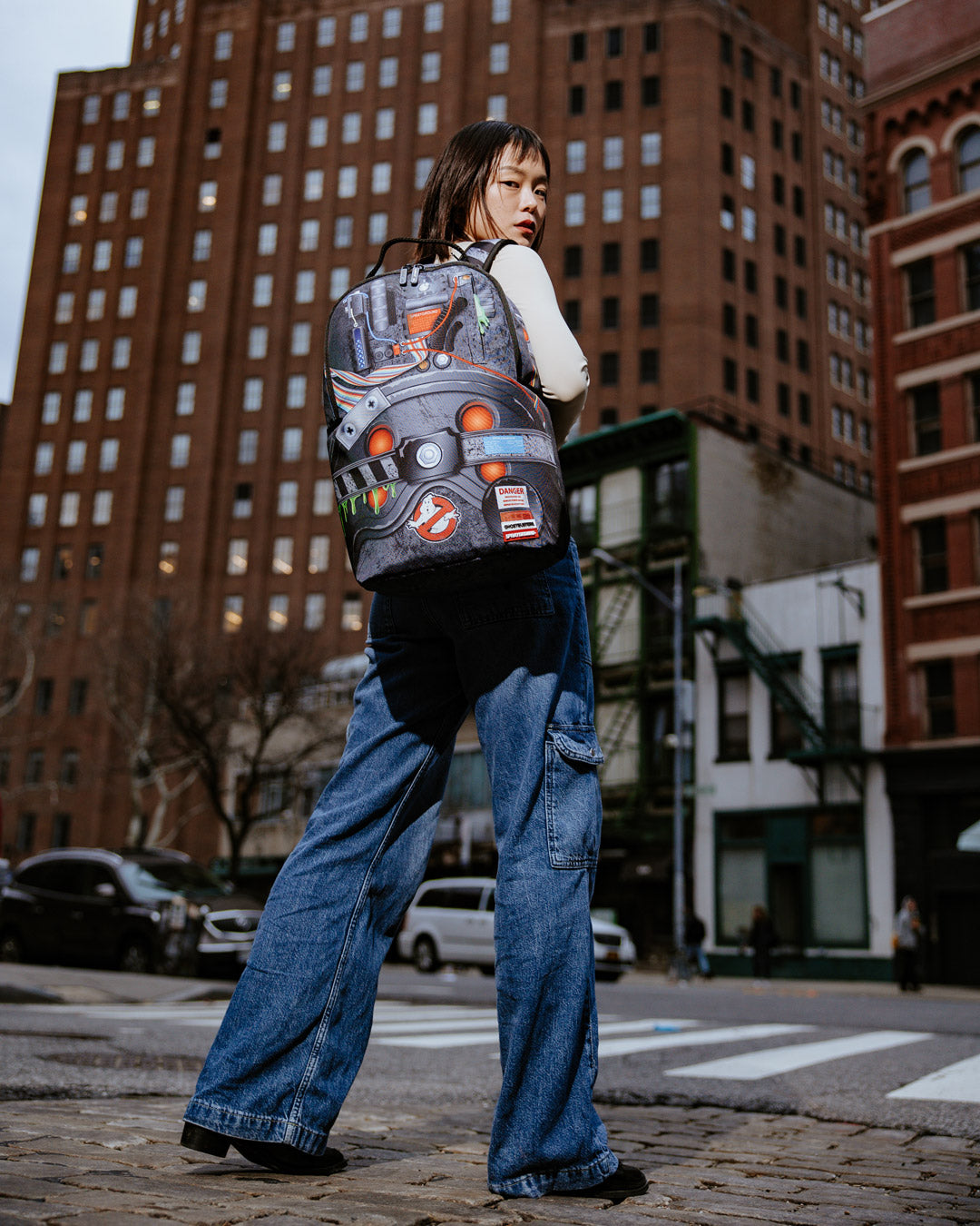 Open interior of clear Sprayground backpack with laptop and organizer compartments visible