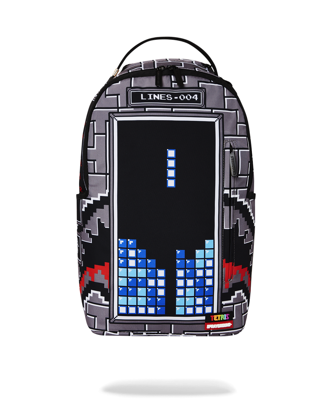 Front view of the pink sprayground backpack with Tetris shark design and gold zippers