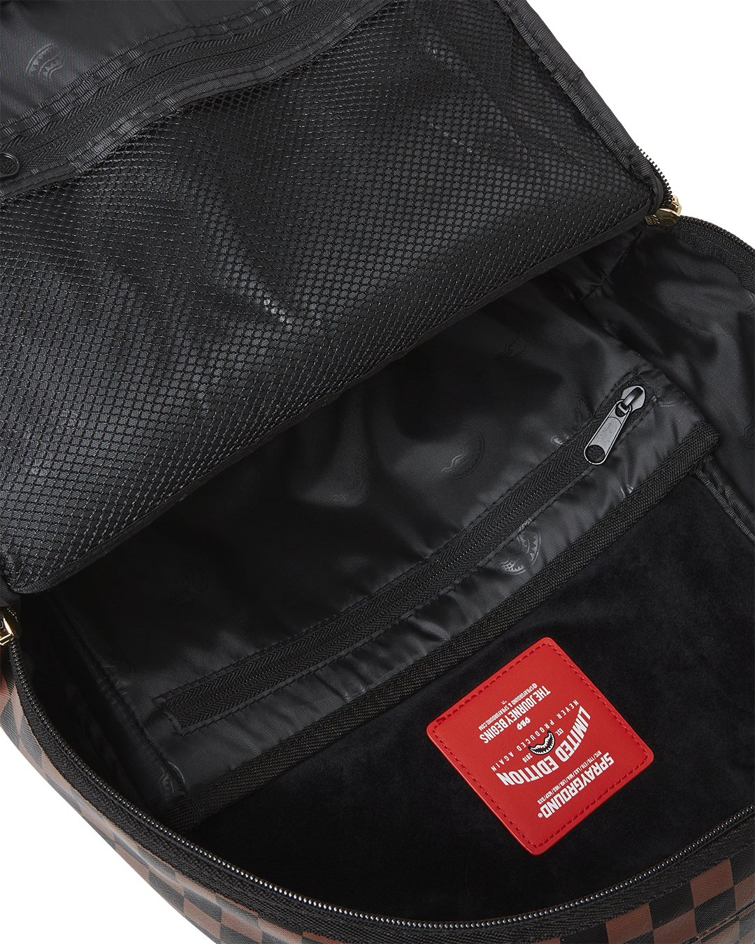 Speedster Travel Backpack connected to carry-on luggage via slide through back sleeve