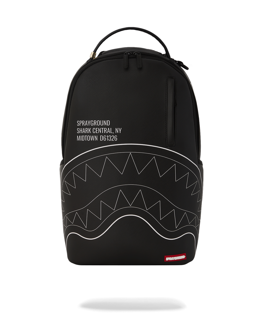 Shark Central faux leather backpack worn by a woman in a city setting