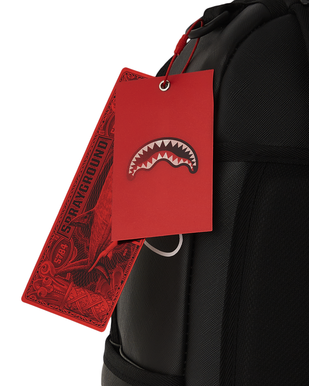 Backpack open to show the velour laptop compartment and interior organization