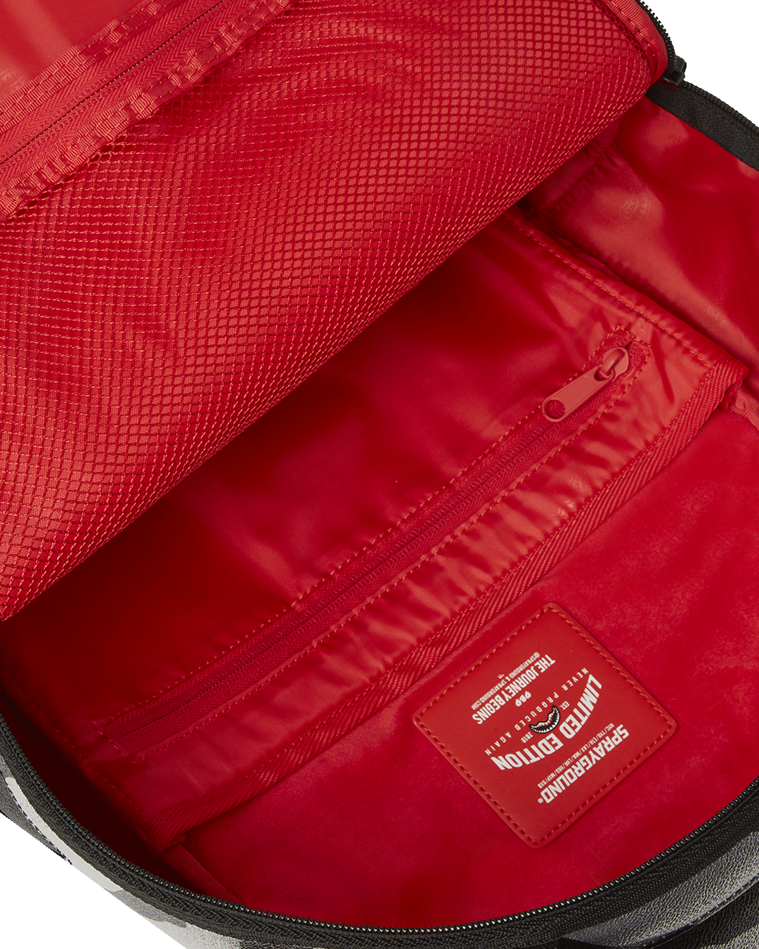 Faux leather backpack with front zipper pocket and side pockets, perfect for daily commutes.