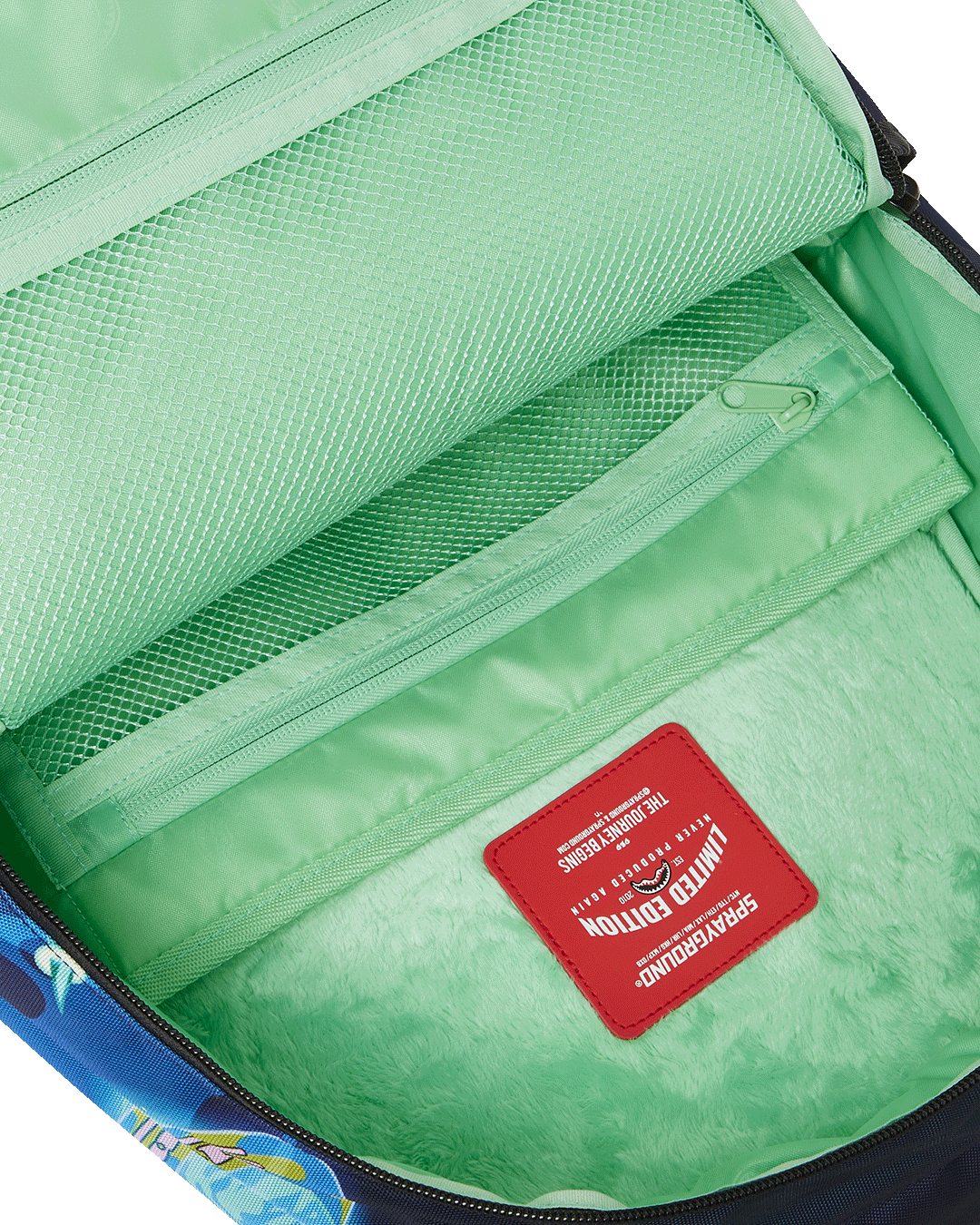 Side angle showing DLXSR backpack compartments and ergonomic padding