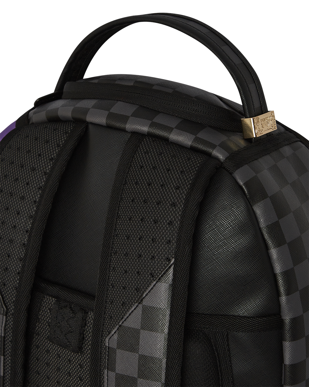 Close-up of the backpacks interior, featuring separate velour laptop compartment