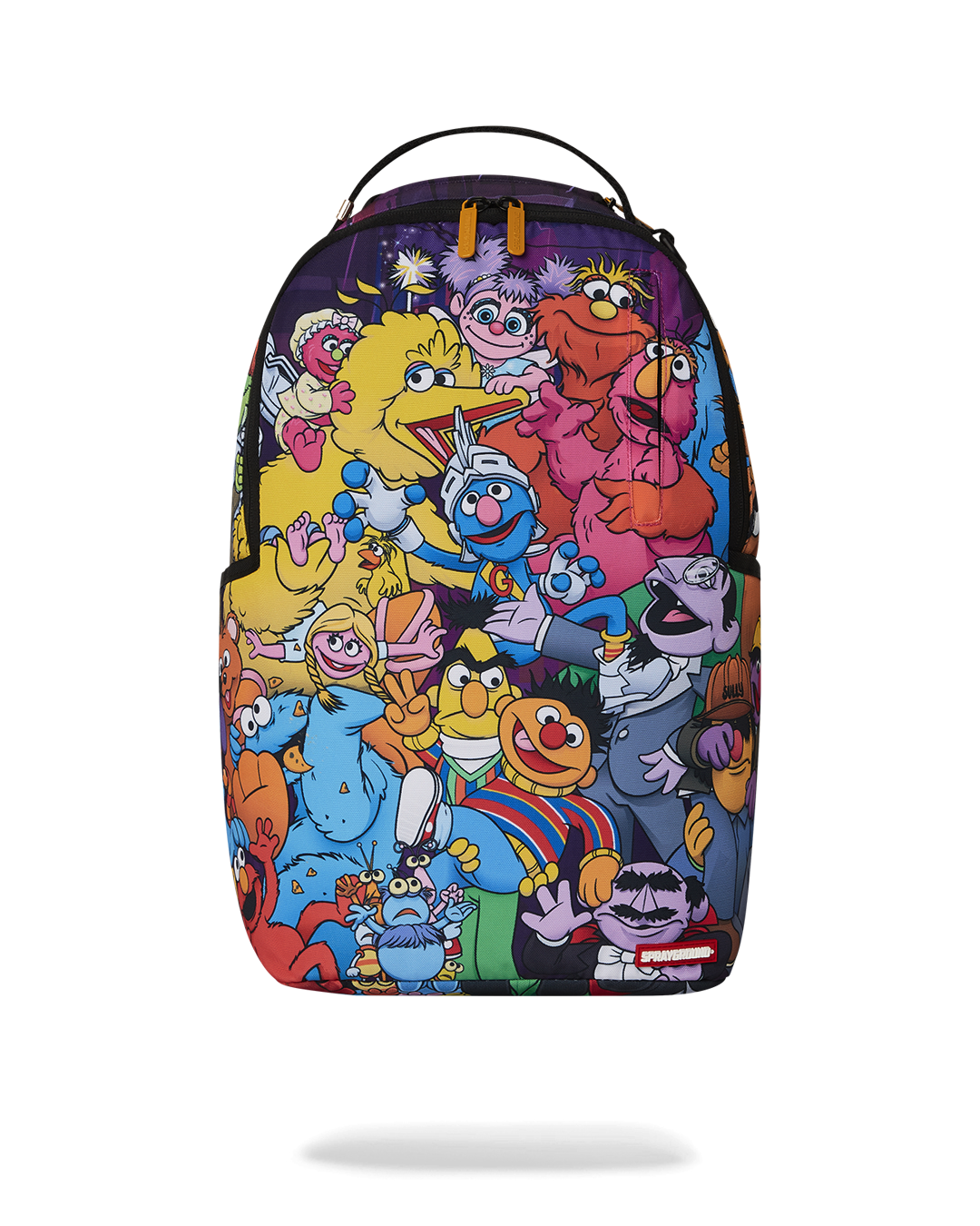Front view of pink Sprayground backpack with Sesame Street graphics and gold zippers