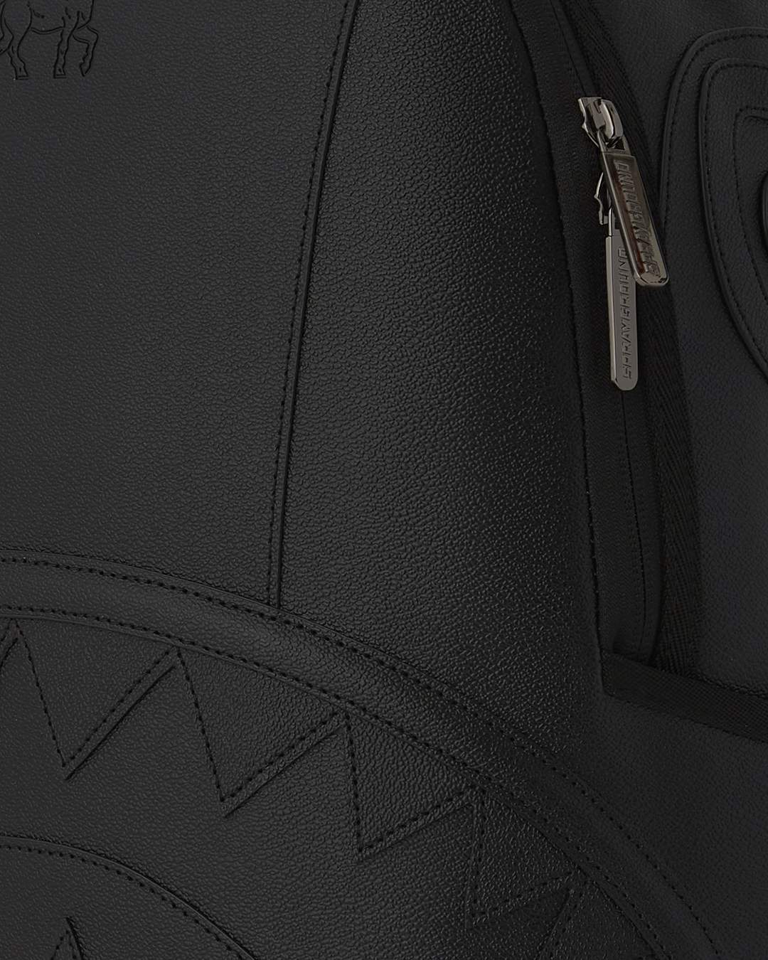 Dark Knight embossed backpack showcasing front zipper and side pockets.
