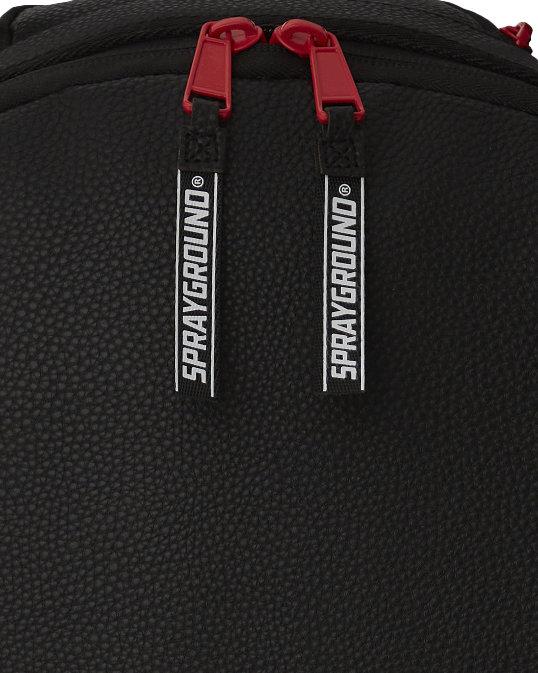 Silent Mirage backpack front view with zippered pockets and gold hardware