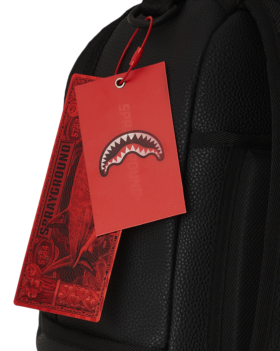 Side angle showing adjustable straps and mesh back padding