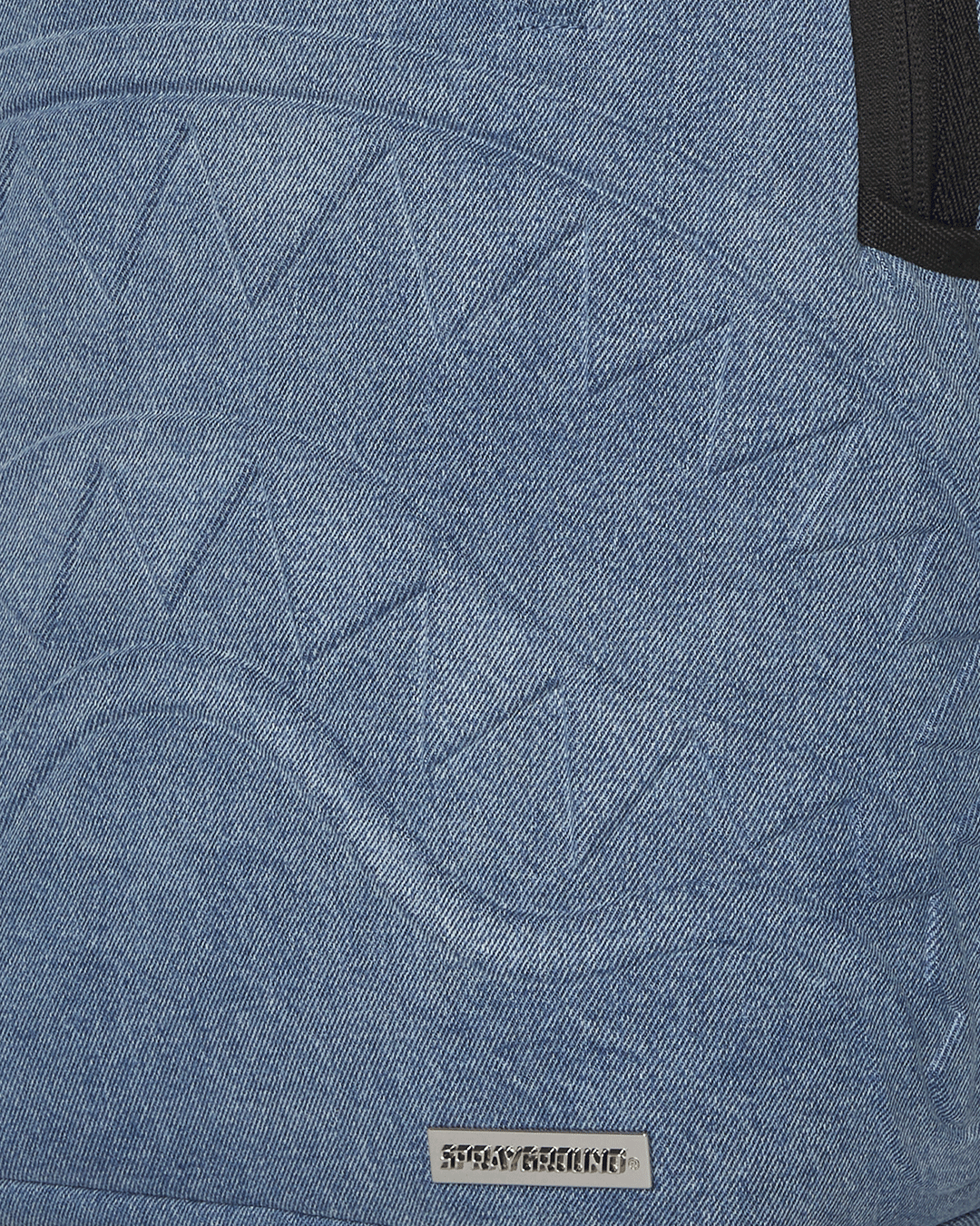 Side view of the faux leather mini backpack with water-resistant fabric and metal hardware