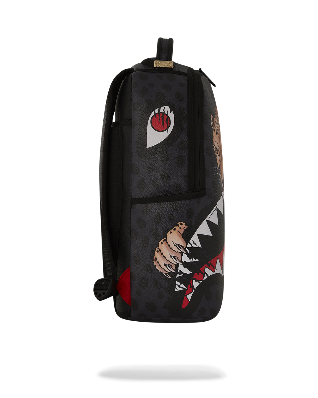 Woman carrying the pink Sprayground backpack at an airport, showcasing its travel-ready design.