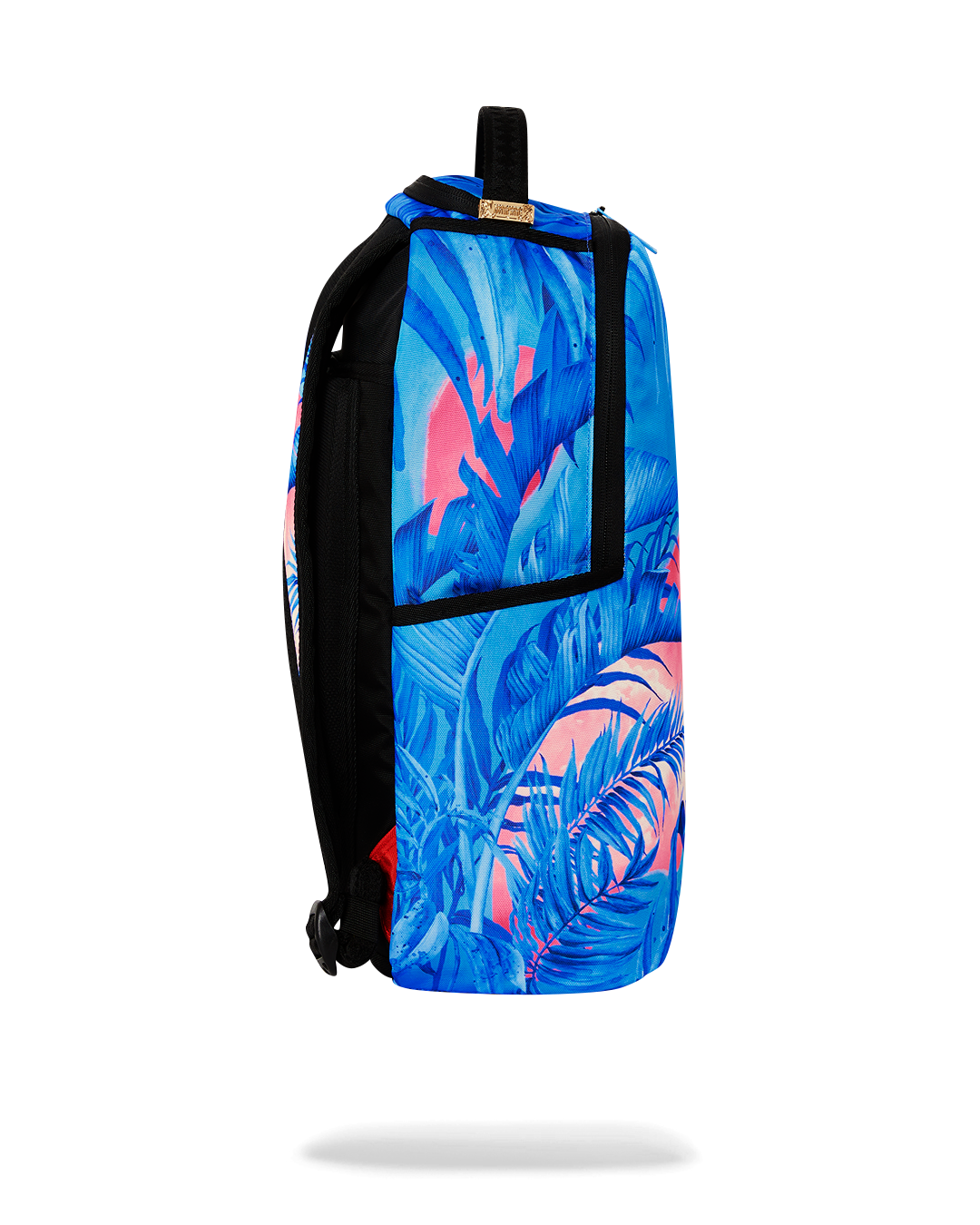 Interior of the Miami Sunset Deluxe Backpack showcasing laptop compartment