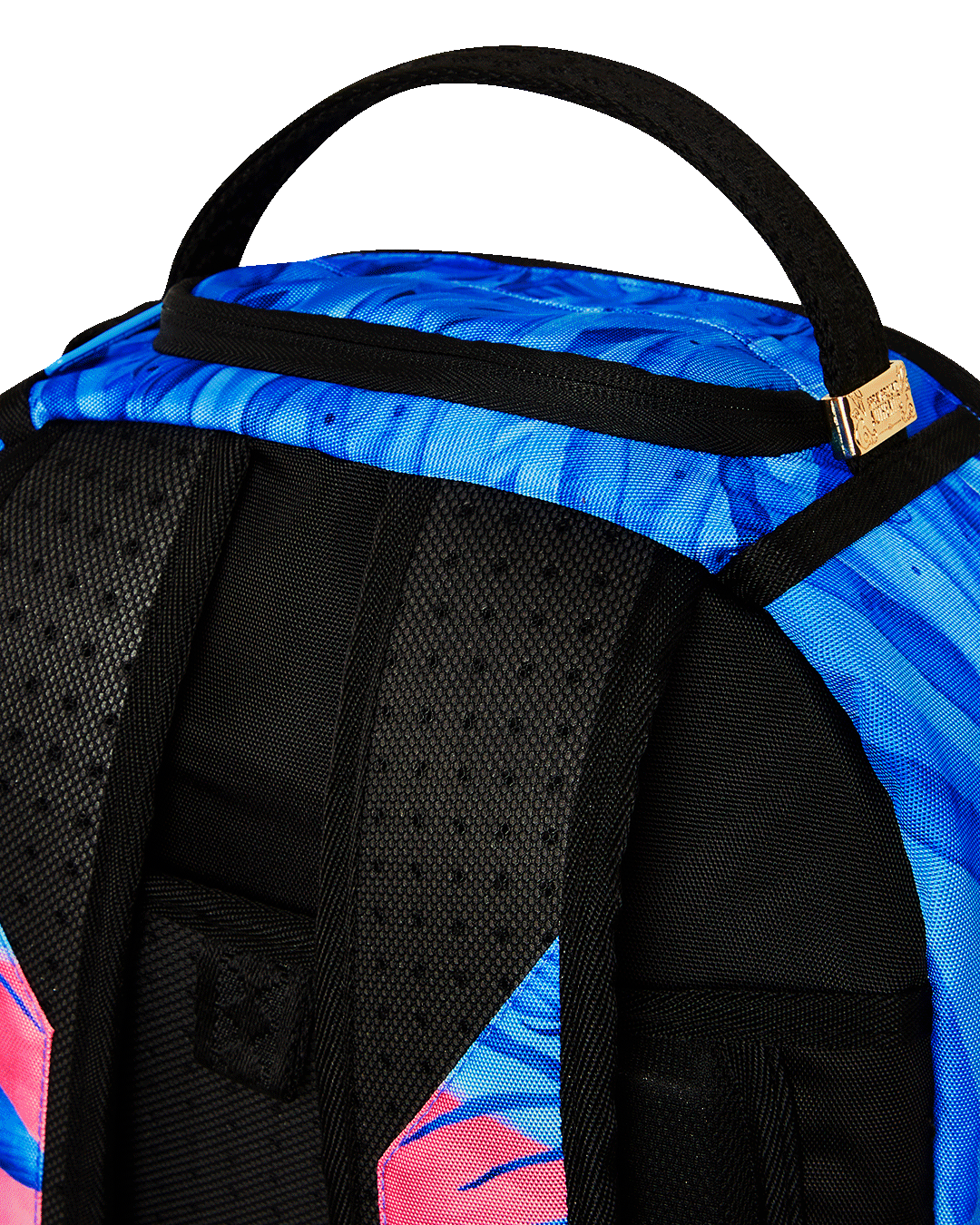 Interior of the Miami Sunset Deluxe Backpack showcasing laptop compartment