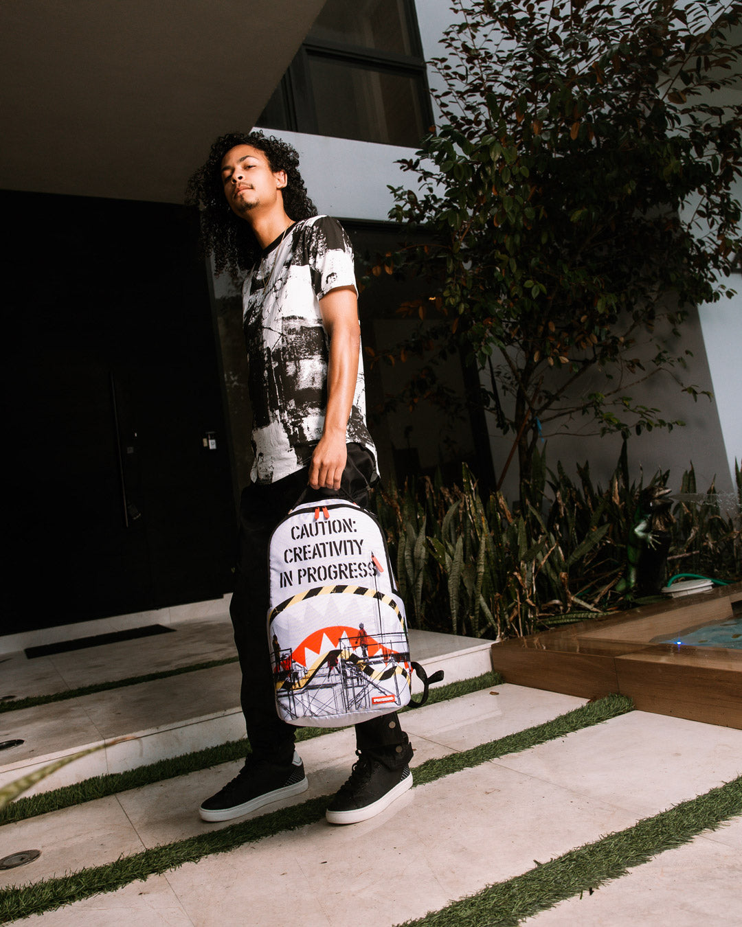 Sprayground backpack with adjustable straps and ergonomic padding.