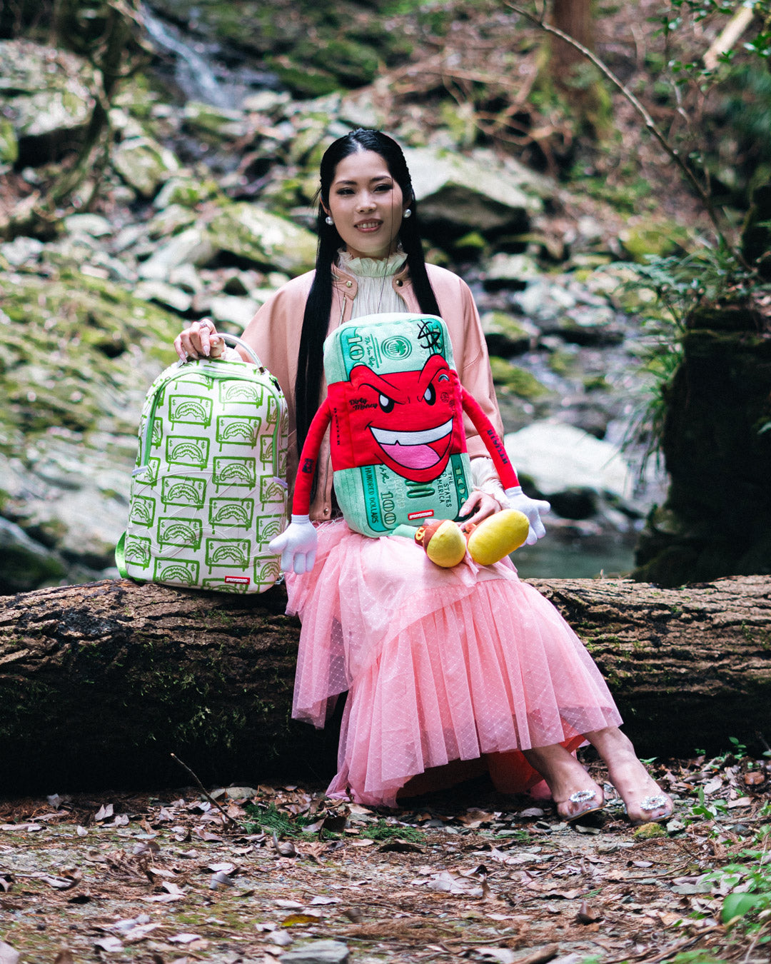 Front view of plush backpack showcasing zippered belly pocket