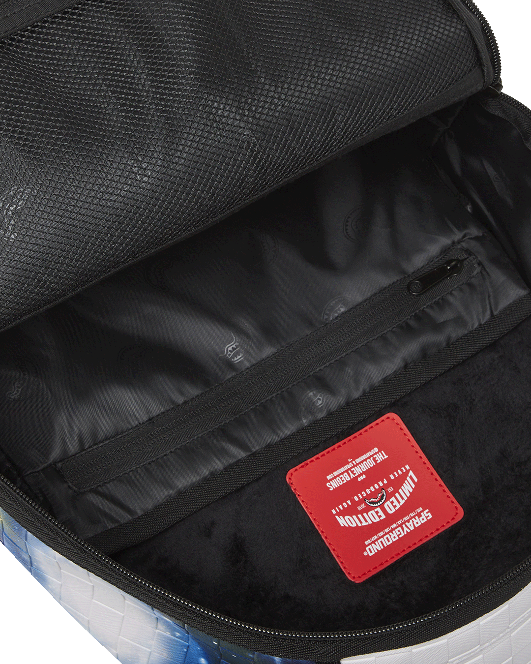 Interior view of the laptop compartment and organizer pocket.
