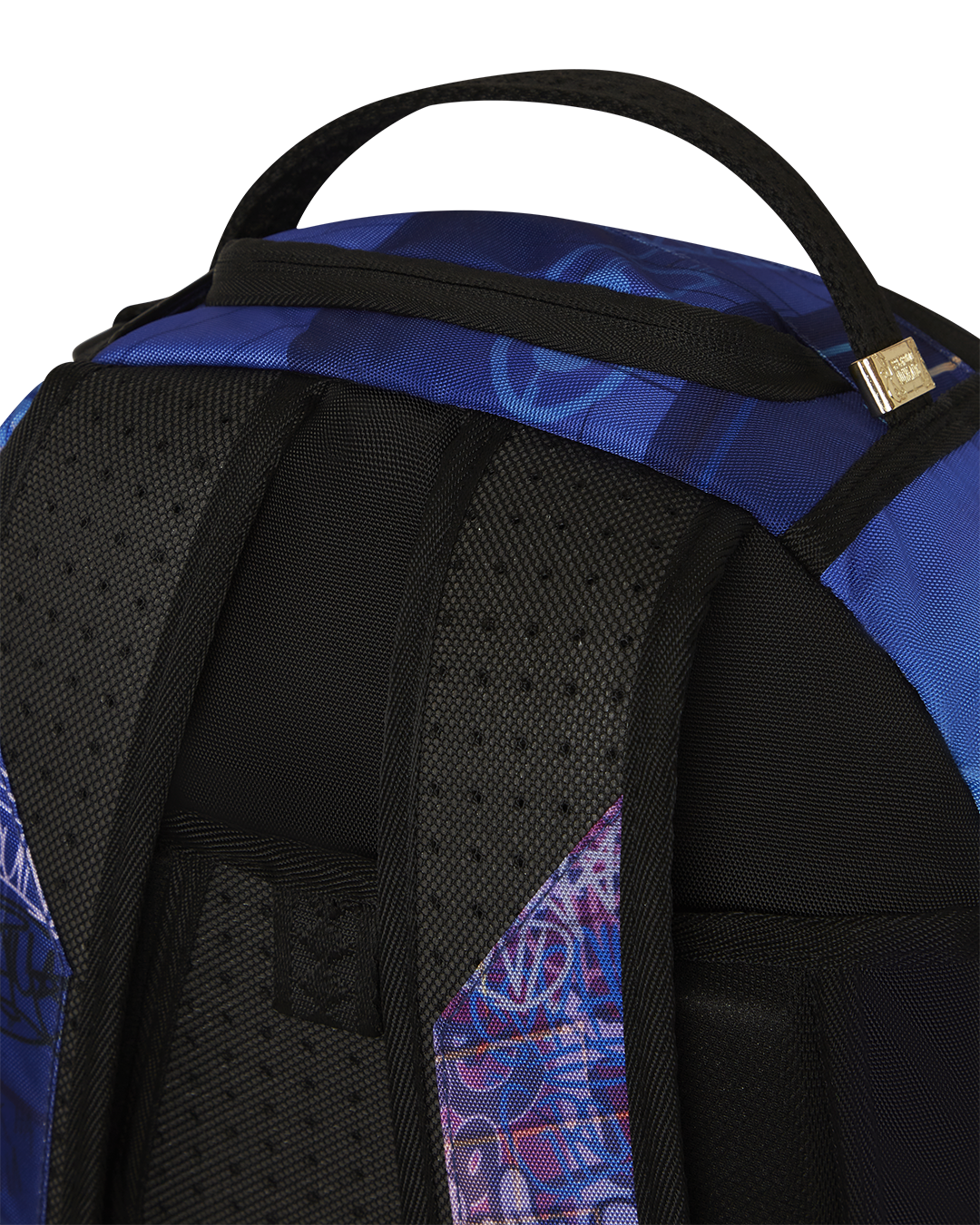Sprayground Harley Quinn backpack worn by a model in urban setting