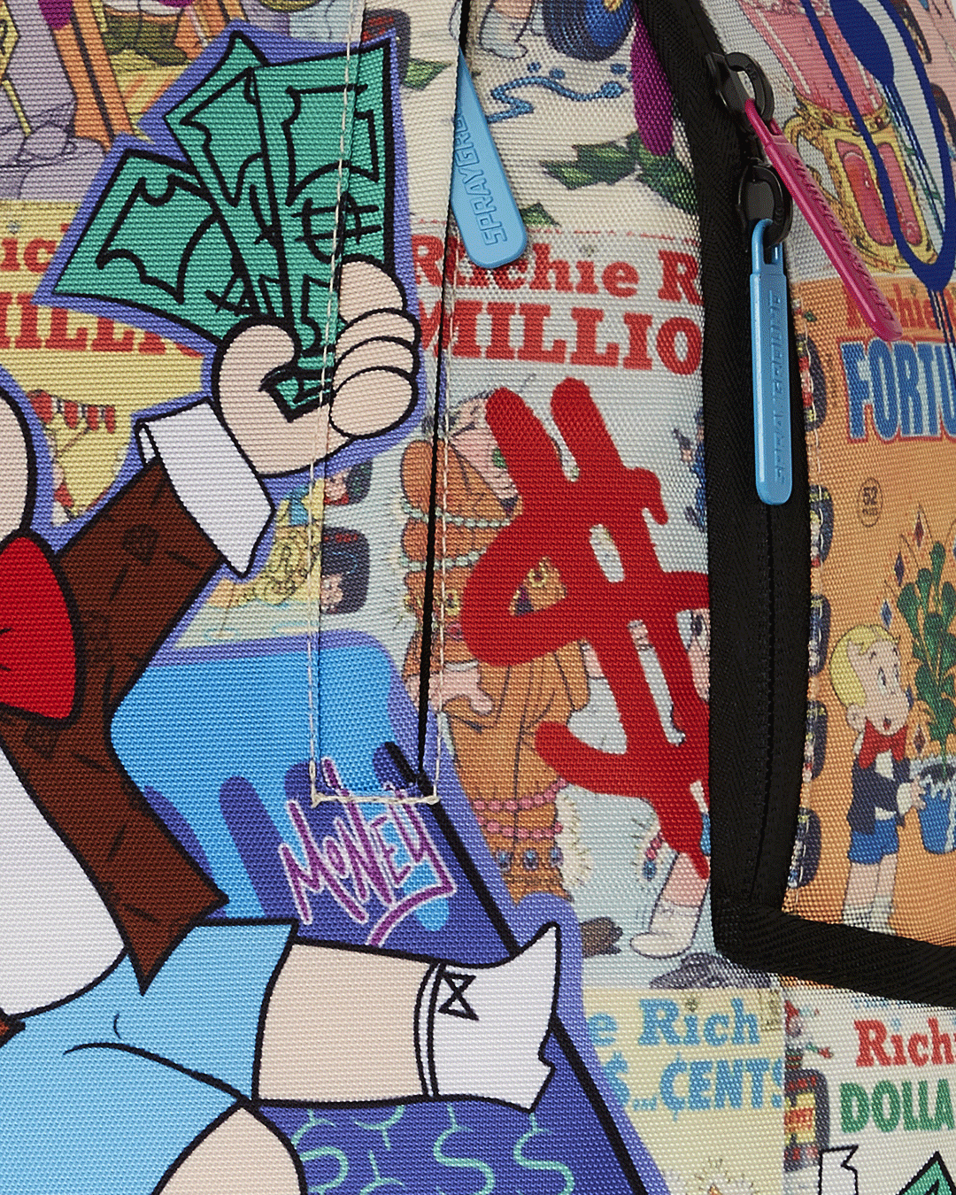 Interior view of Richie Rich Deluxe Sprayground Backpack with laptop compartment and mesh organizer.