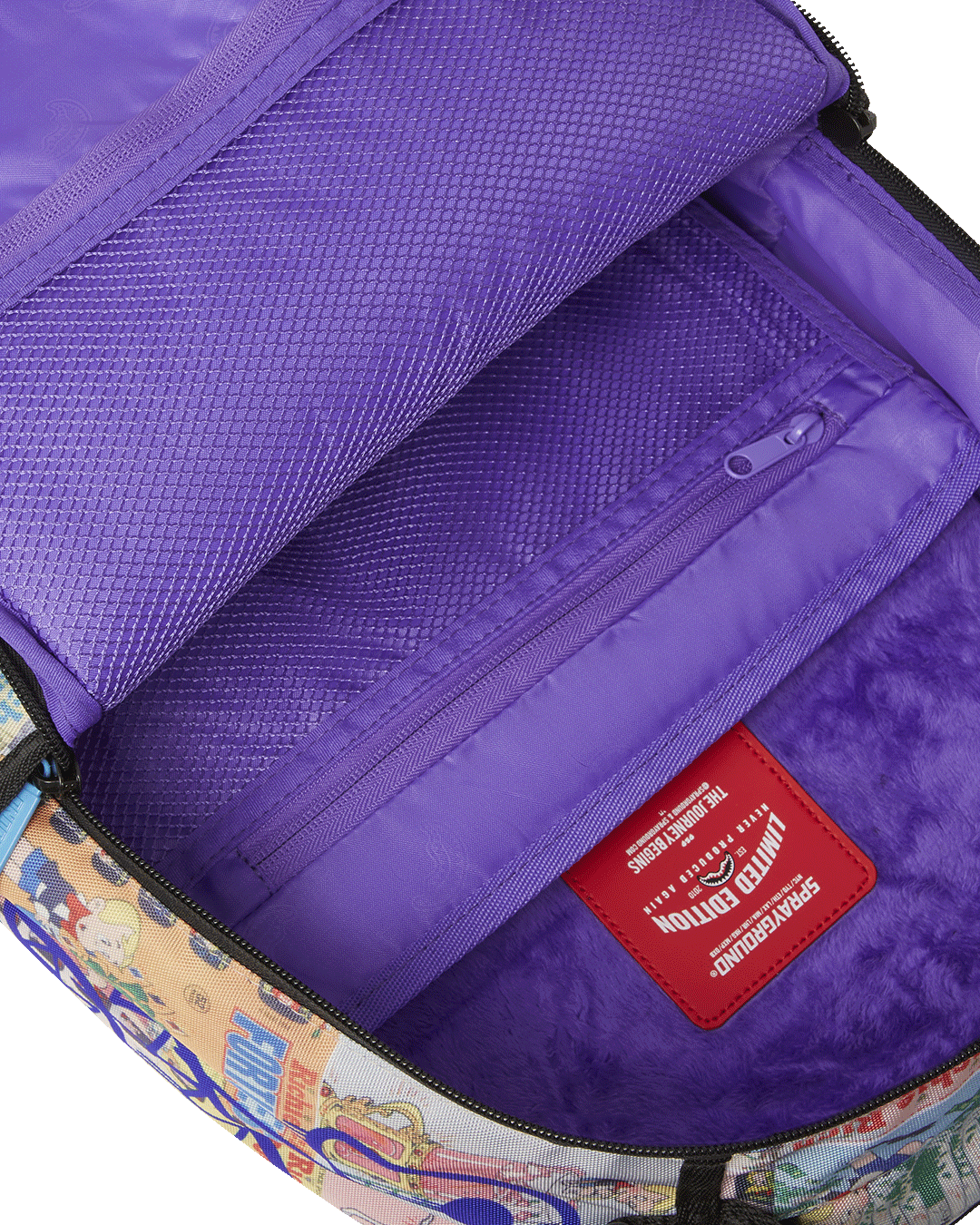 Richie Rich Deluxe Sprayground Backpack showcasing front zipper pocket and side pockets.