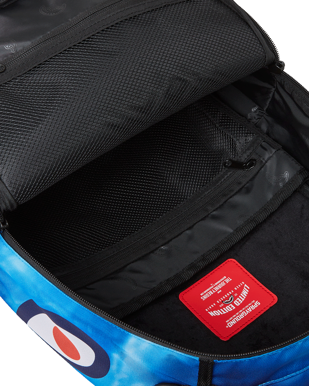 Side angle showing ergonomic straps and luggage sleeve