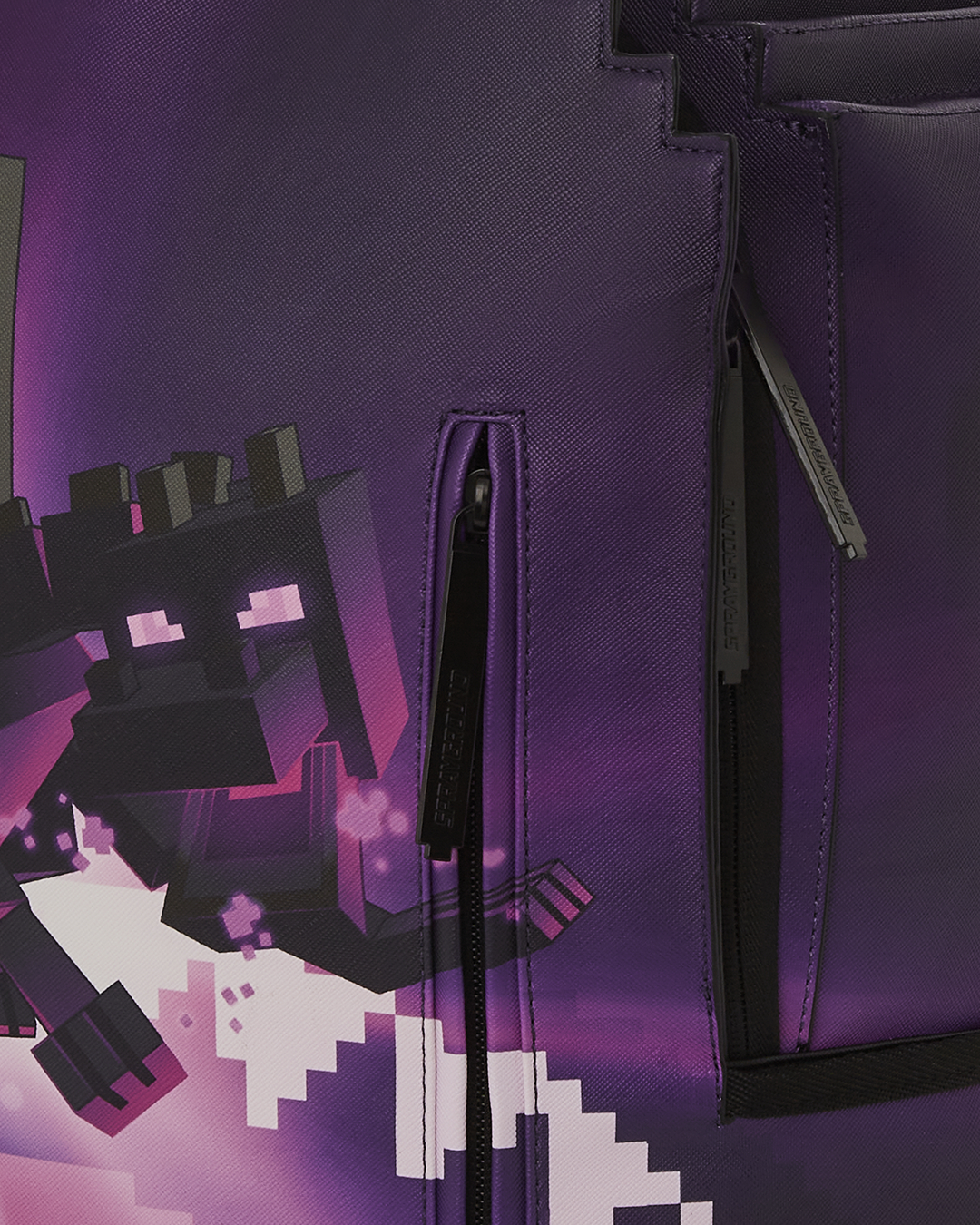 Close-up of faux leather texture and pixelated Ender Dragon design