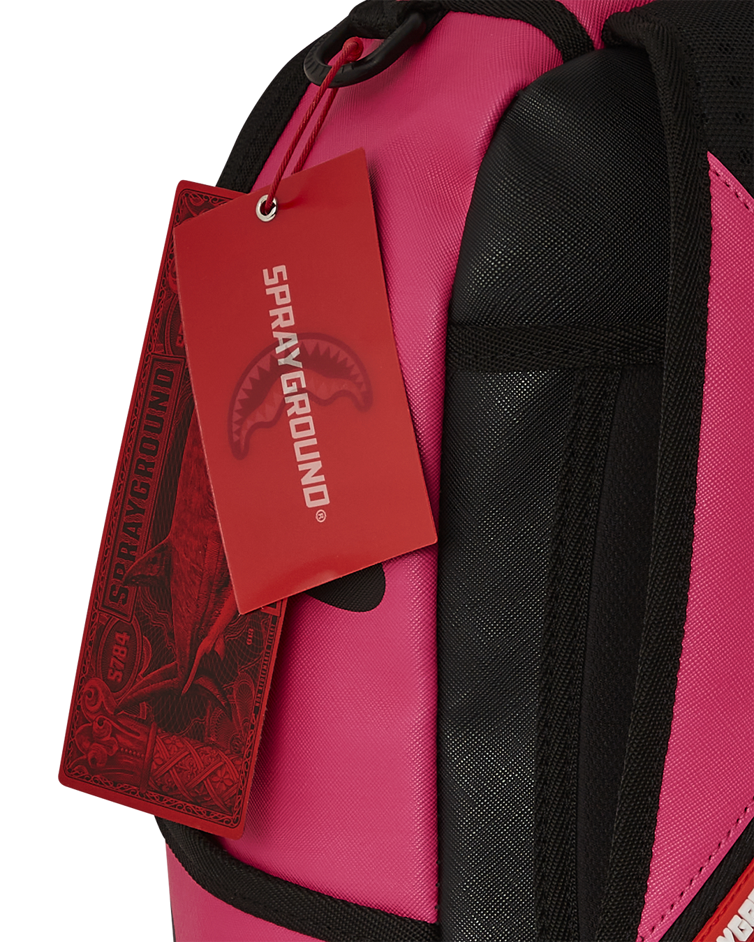 Interior view of the backpack showing separate velour laptop compartment and mesh organizer pocket.