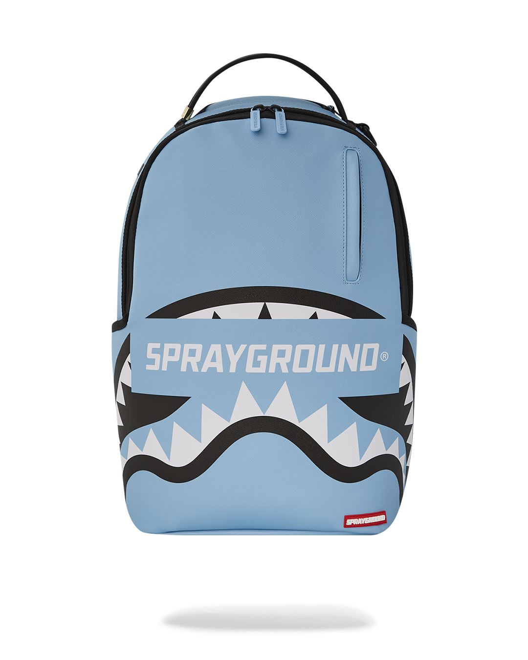 Sprayground faux leather backpack open, showcasing interior compartments