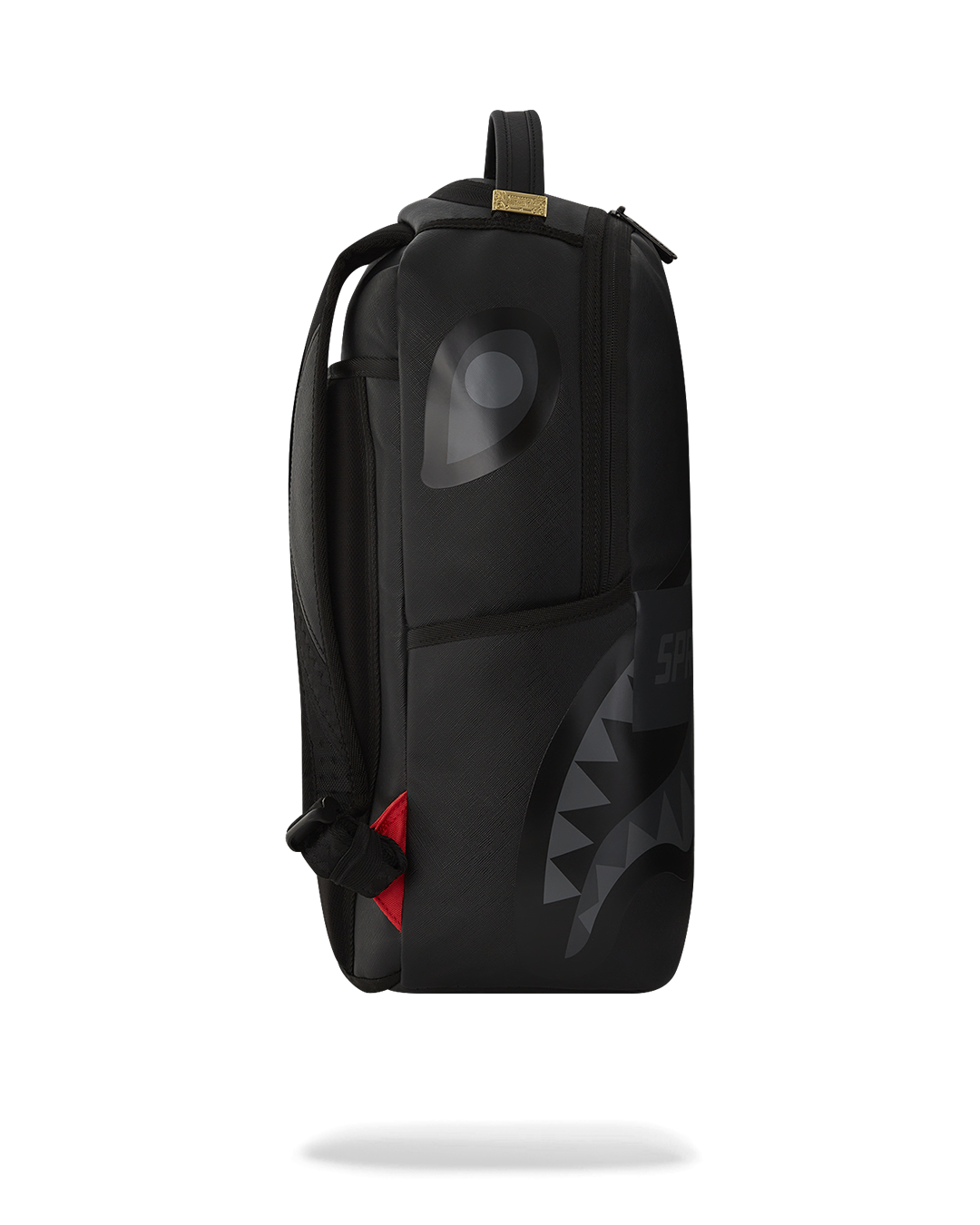 Interior view of the laptop compartment and mesh organizer in the designer backpack