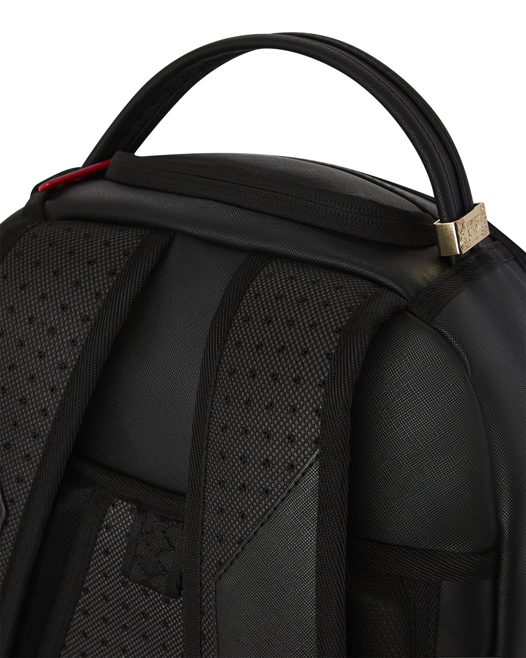 Interior view of the laptop compartment and mesh organizer in the designer backpack