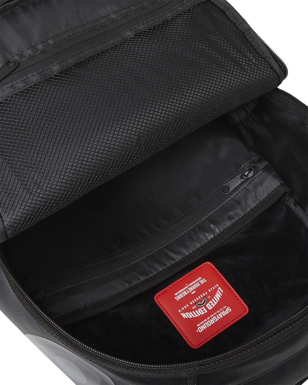 Side view of the water-resistant faux leather backpack with adjustable straps