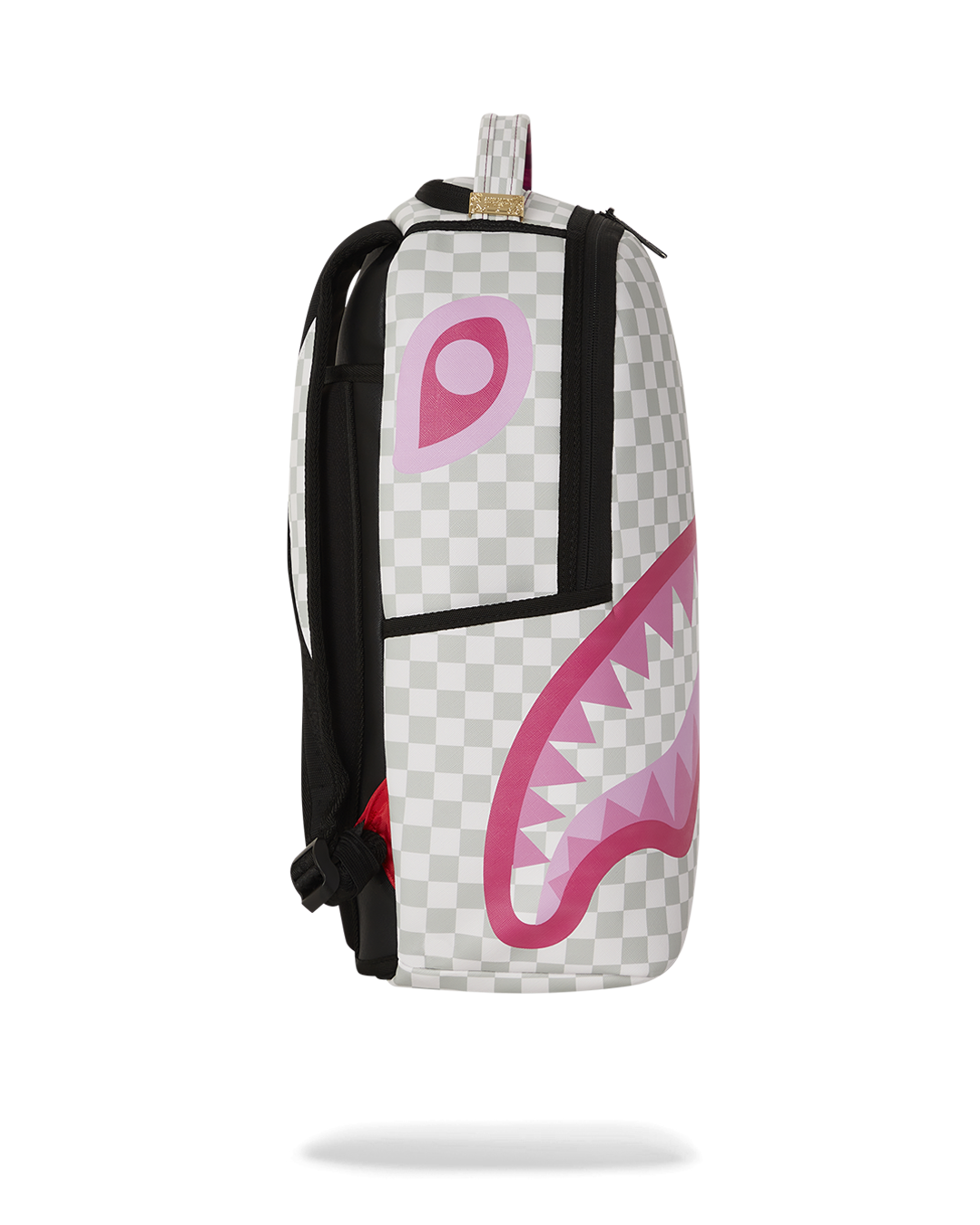 Side view of travel backpack with adjustable straps and luggage sleeve