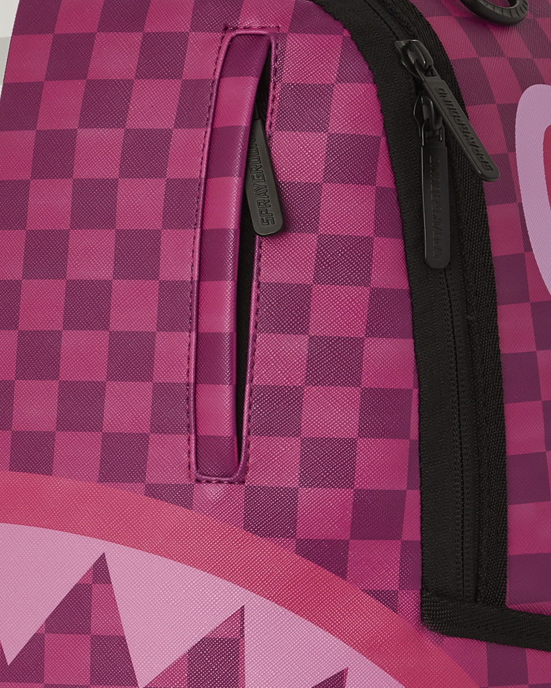 Side view of travel backpack with adjustable straps and luggage sleeve