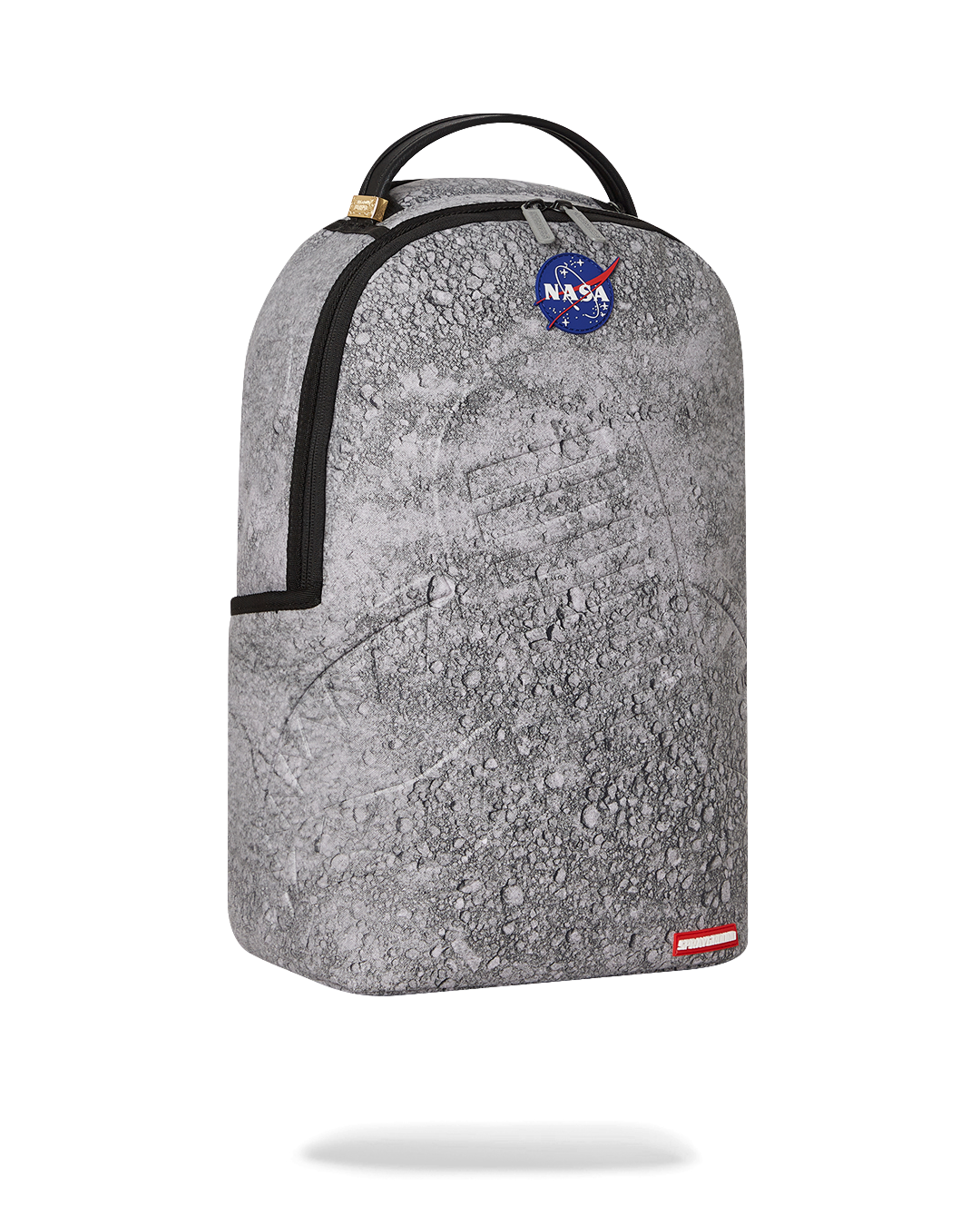 Close-up of the Sprayground NASA backpacks front zipper pocket and gold zippers with metal hardware.
