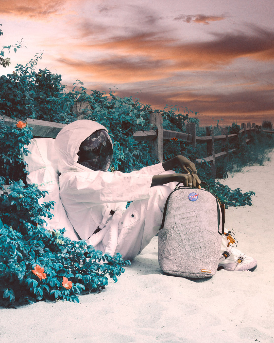 Back view of the Sprayground NASA Moon Shark backpack, highlighting the ergonomic mesh back padding.