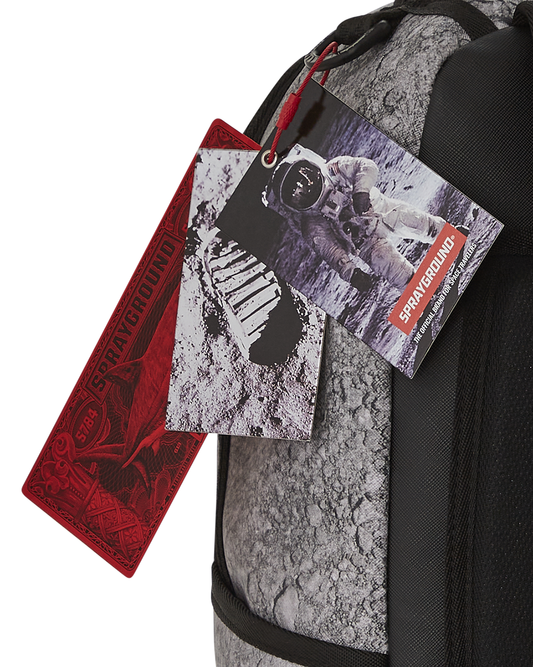 Back view of the Sprayground NASA Moon Shark backpack, highlighting the ergonomic mesh back padding.