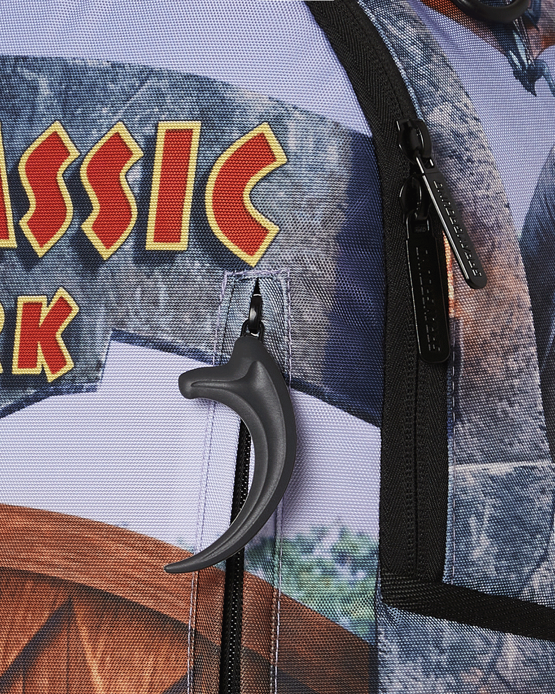 Sprayground Jurassic Shark Backpack with separate velour sunglass compartment and gold zippers