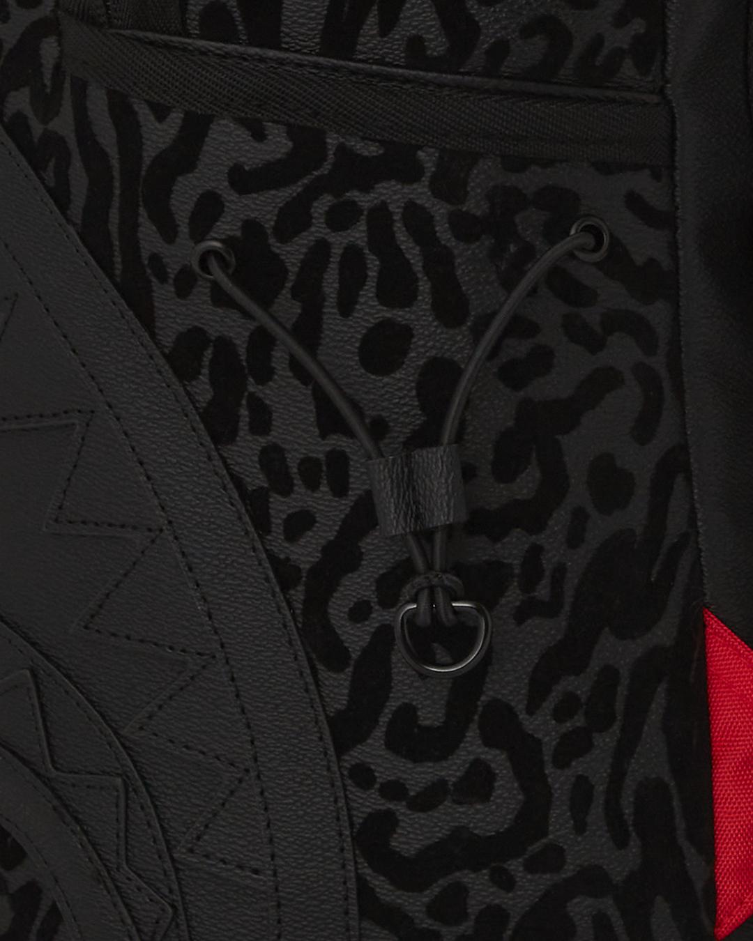 Interior shot showing velour-lined laptop compartment and organized mesh pocket