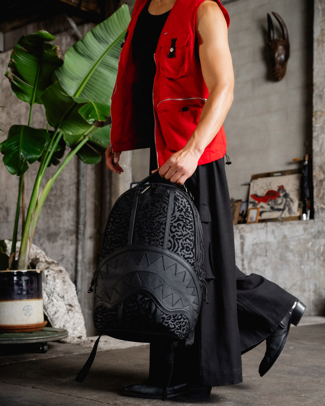 Interior shot showing velour-lined laptop compartment and organized mesh pocket