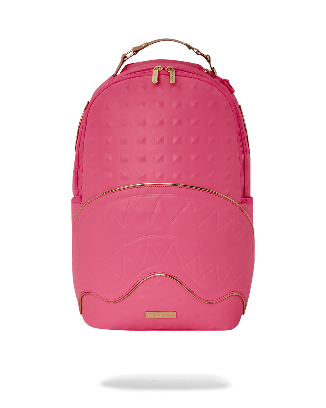Close-up of the faux leather exterior with gold hardware on the Sprayground backpack